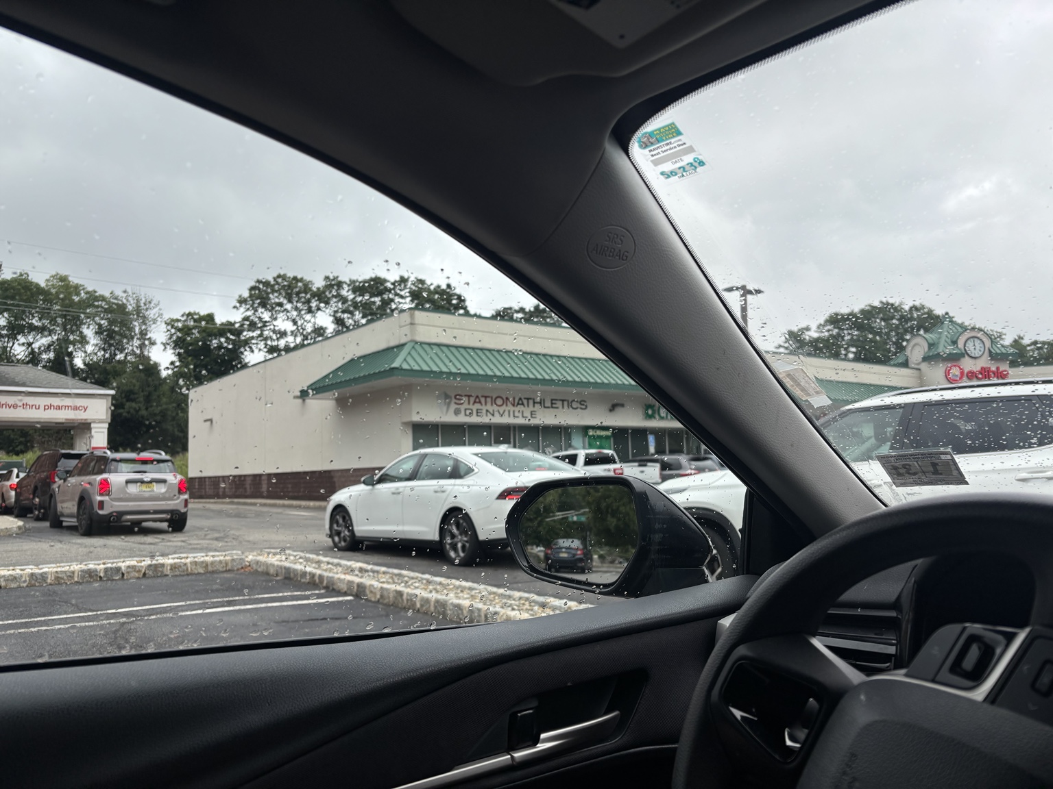 Rainy CVS drive-thru line in Denville